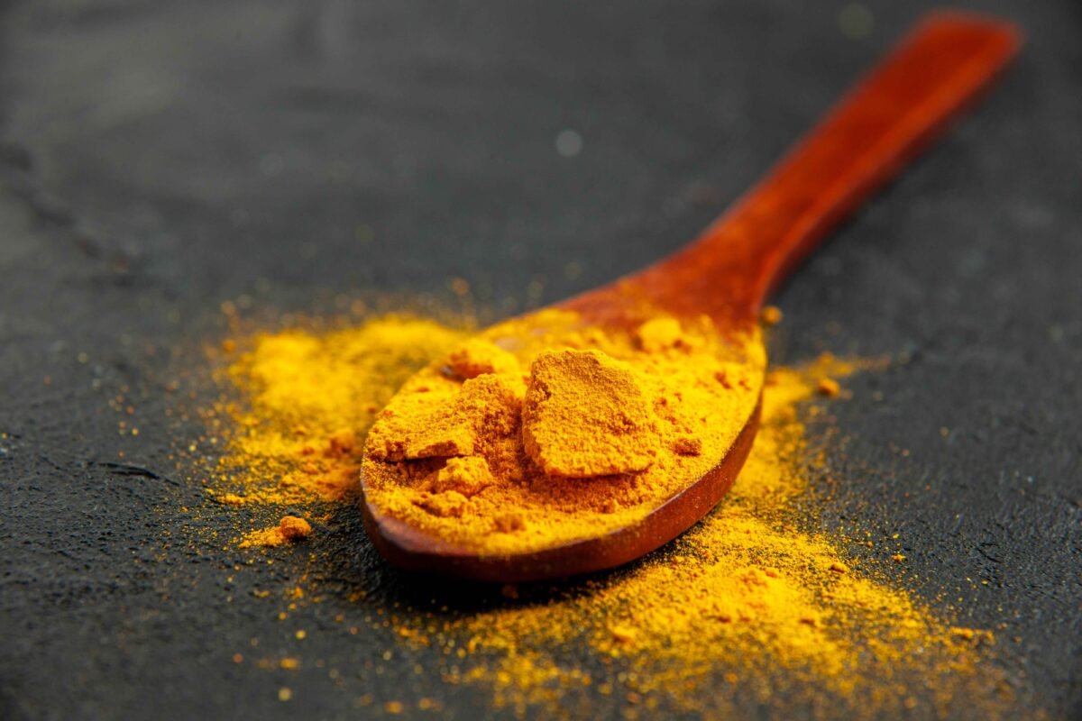 Bright yellow turmeric fingers and powder exported by RDS ENTERPRISES for food and medicinal use.