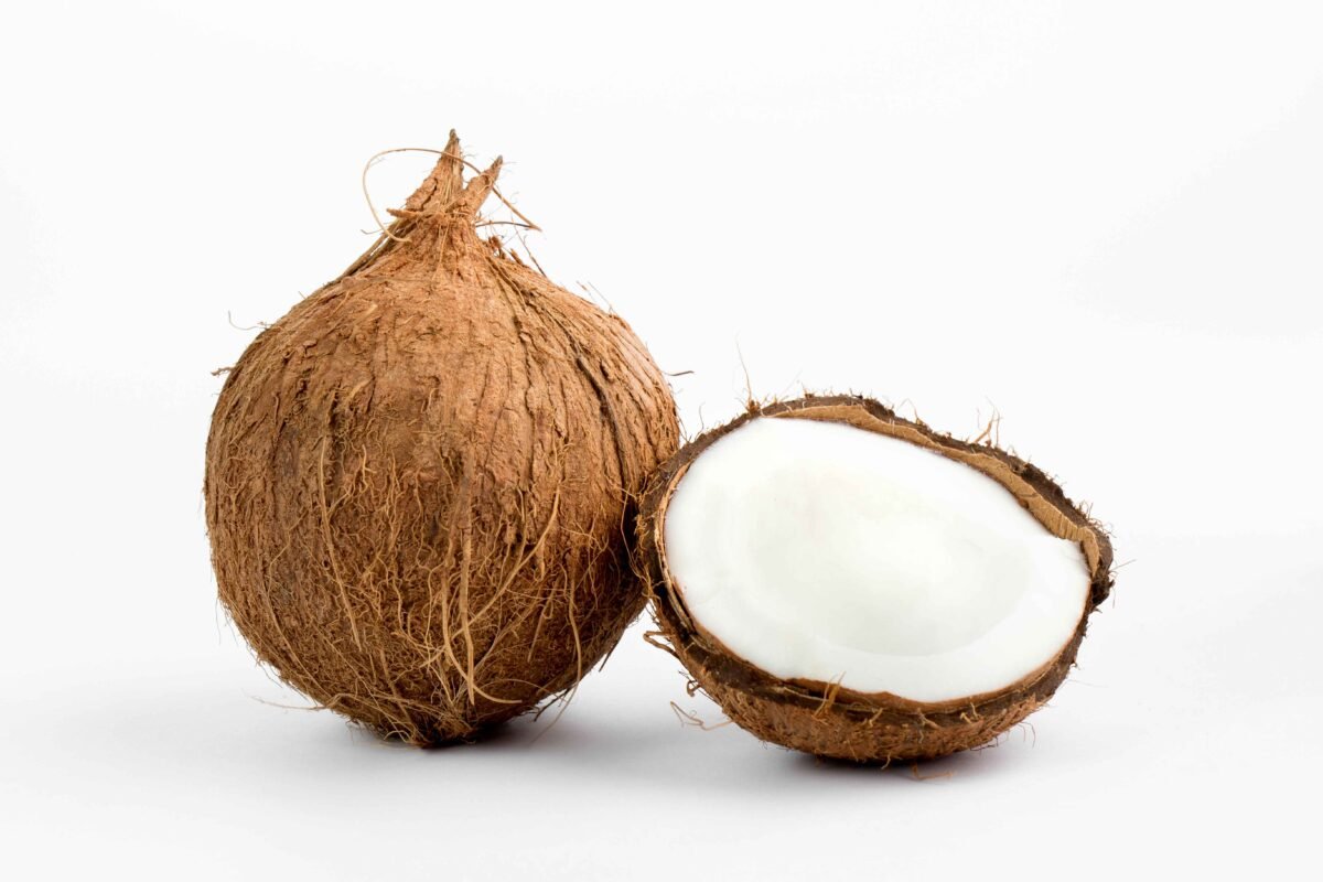 Dehusked and whole Indian coconuts prepared for global shipment by RDS ENTERPRISES.