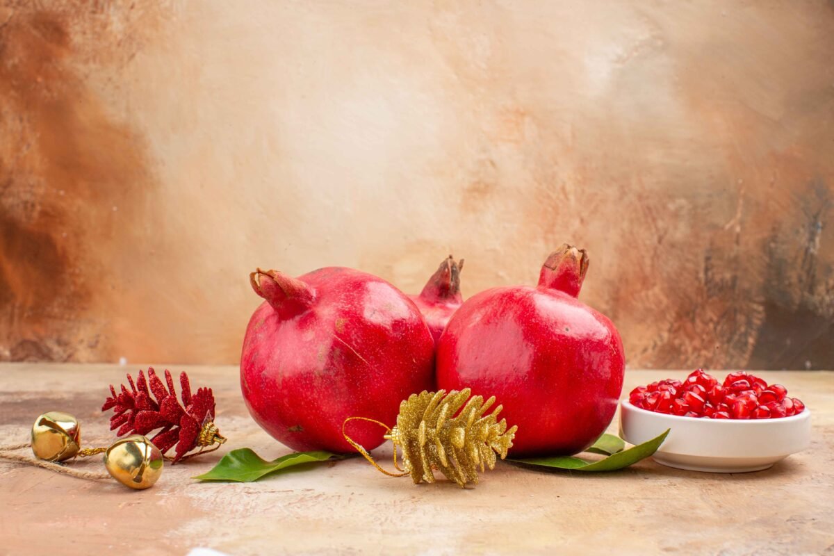 Juicy Indian pomegranates with red arils ready for international export by RDS ENTERPRISES.