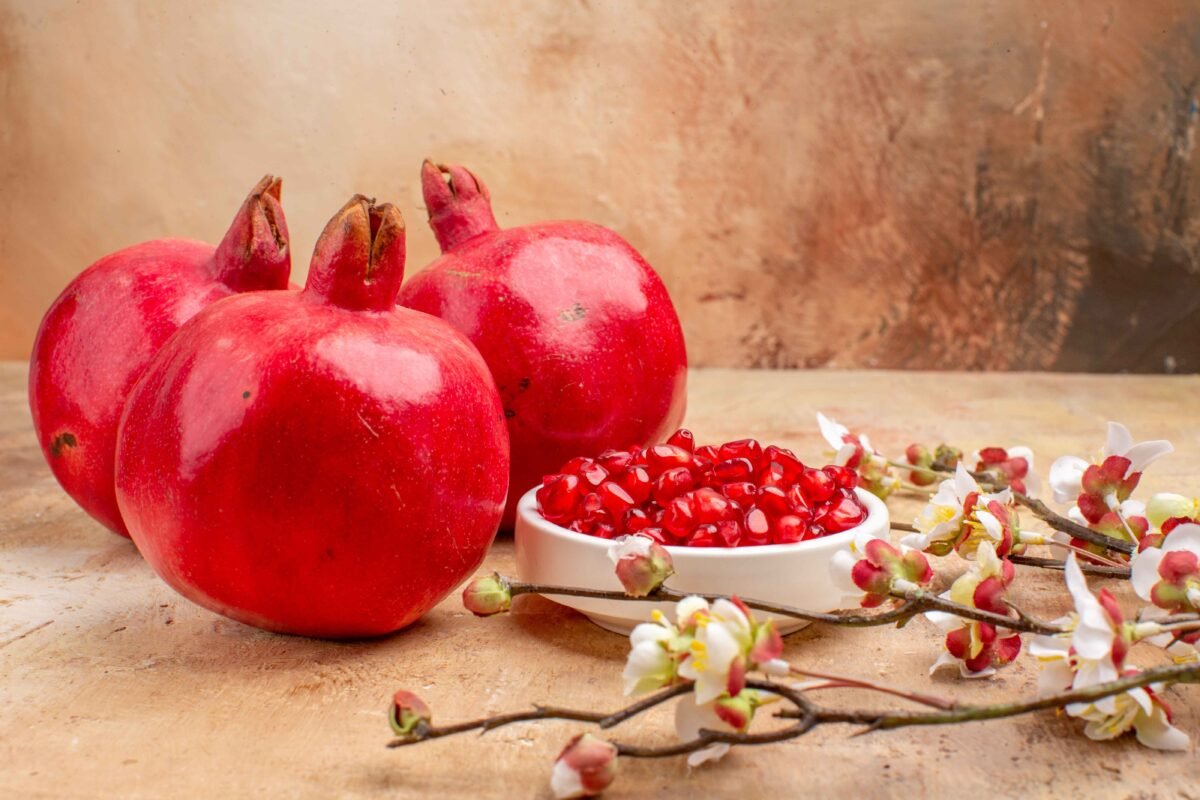 Juicy Indian pomegranates with red arils ready for international export by RDS ENTERPRISES.